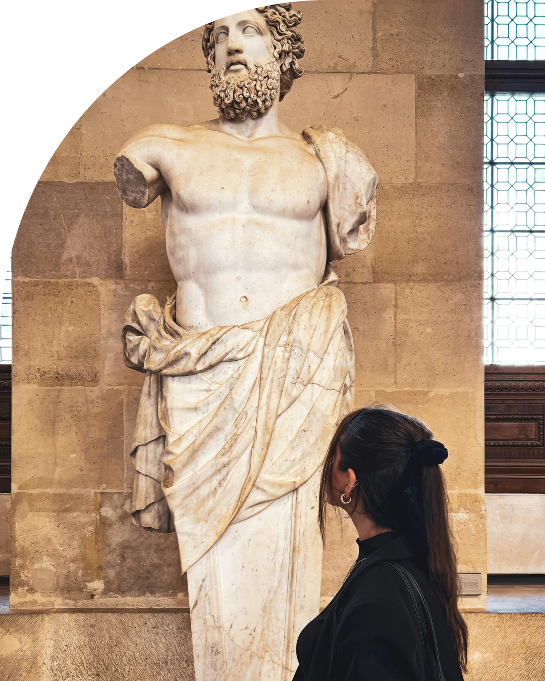 Woman looking at statue